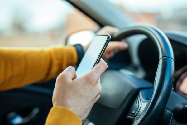 person on phone while driving